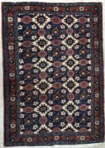 A Caucasian carpet, the central panel se