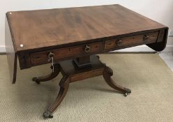 A 19th Century mahogany sofa table, the