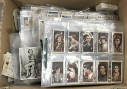 A collection of cigarette cards Stars of