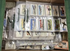 A collection of cigarette cards Aeroplan