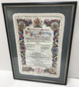 A framed and glazed silk panel inscribed