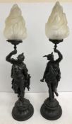 A pair of patinated spelter figural lamp