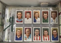 A collection of various cigarette cards