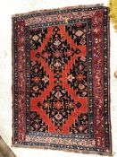 A Caucasian rug, the central panel set w