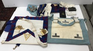 A suitcase of various Masonic regalia an