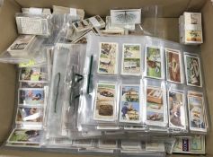 A collection of cigarette cards various