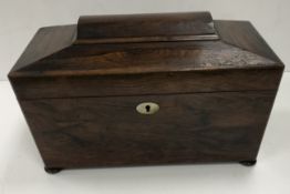 A 19th Century rosewood tea caddy of sar