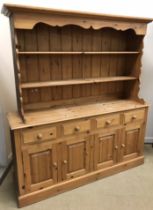 A modern pine dresser, the associated tw