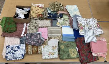 Three boxes of assorted vintage fabric,