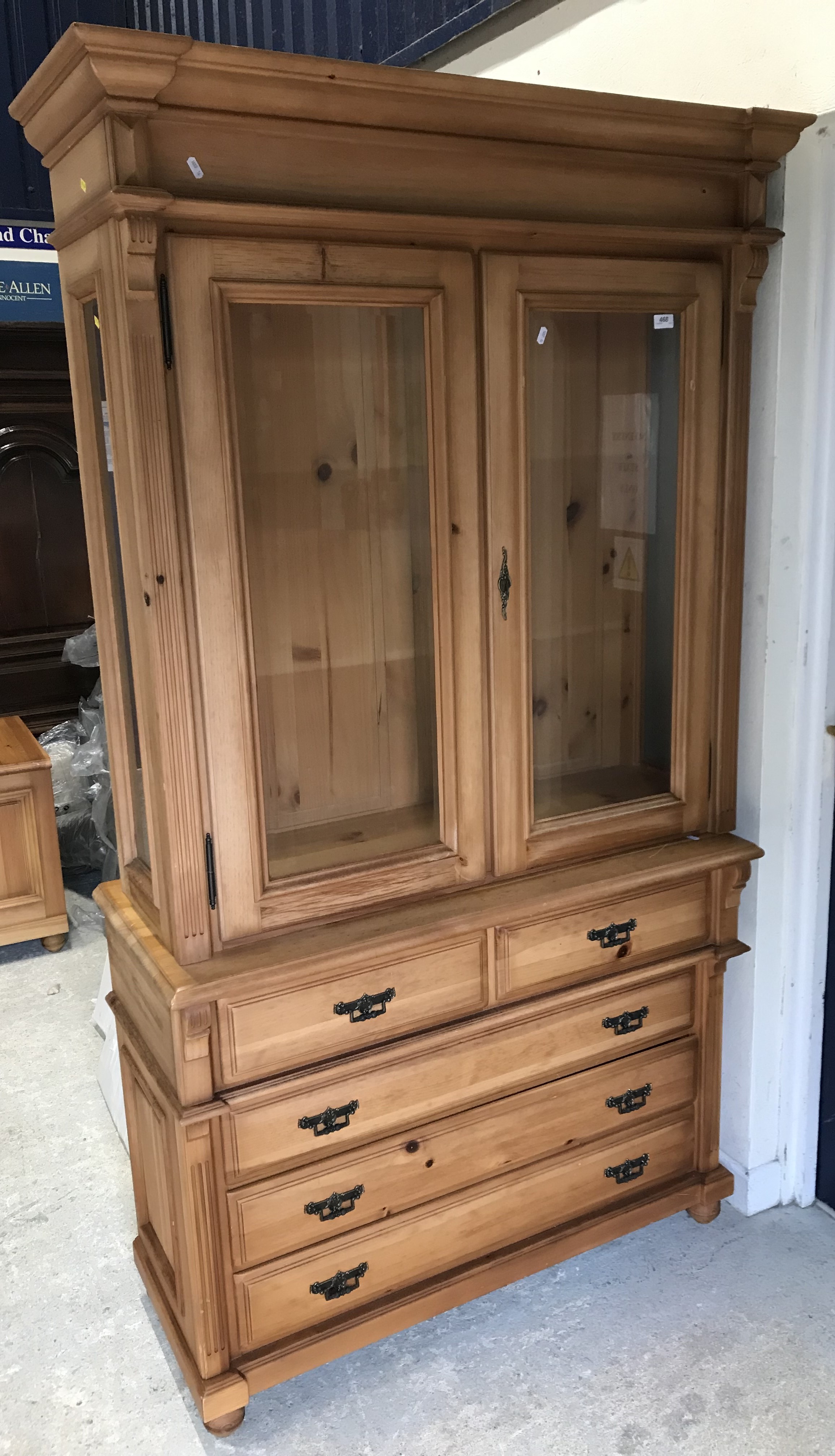 A modern pine china display cabinet with