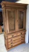 A modern pine china display cabinet with