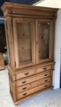 A modern pine china display cabinet with