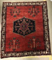 An Afshar rug, the central panel set wit