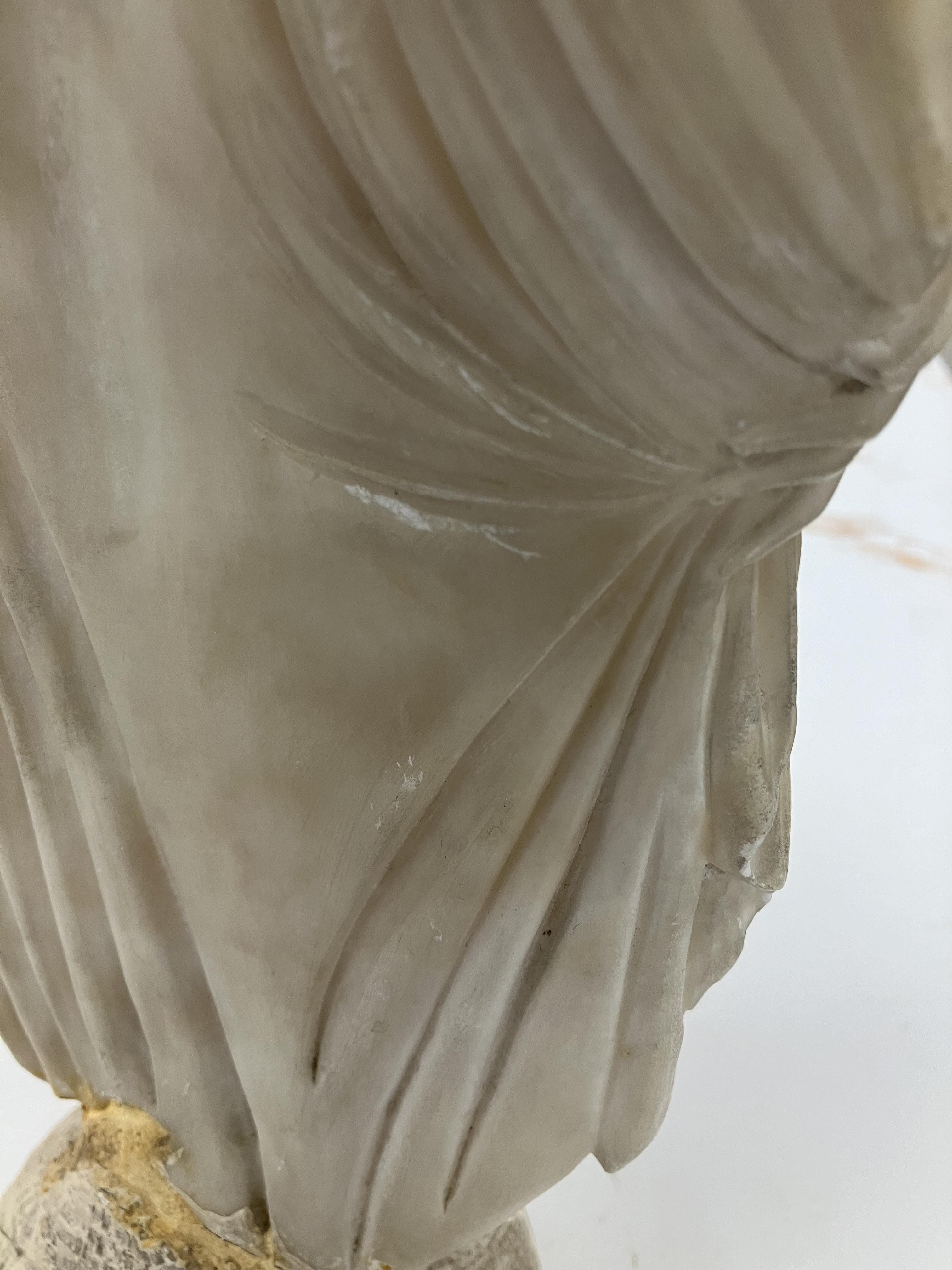 A carved white marble figure of "Phryne' - Image 7 of 42