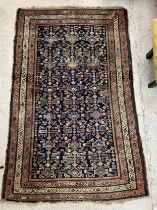 A Caucasian rug, the central panel set w