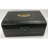 A late Victorian leather covered travell