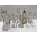 A collection of seven decanters, includi