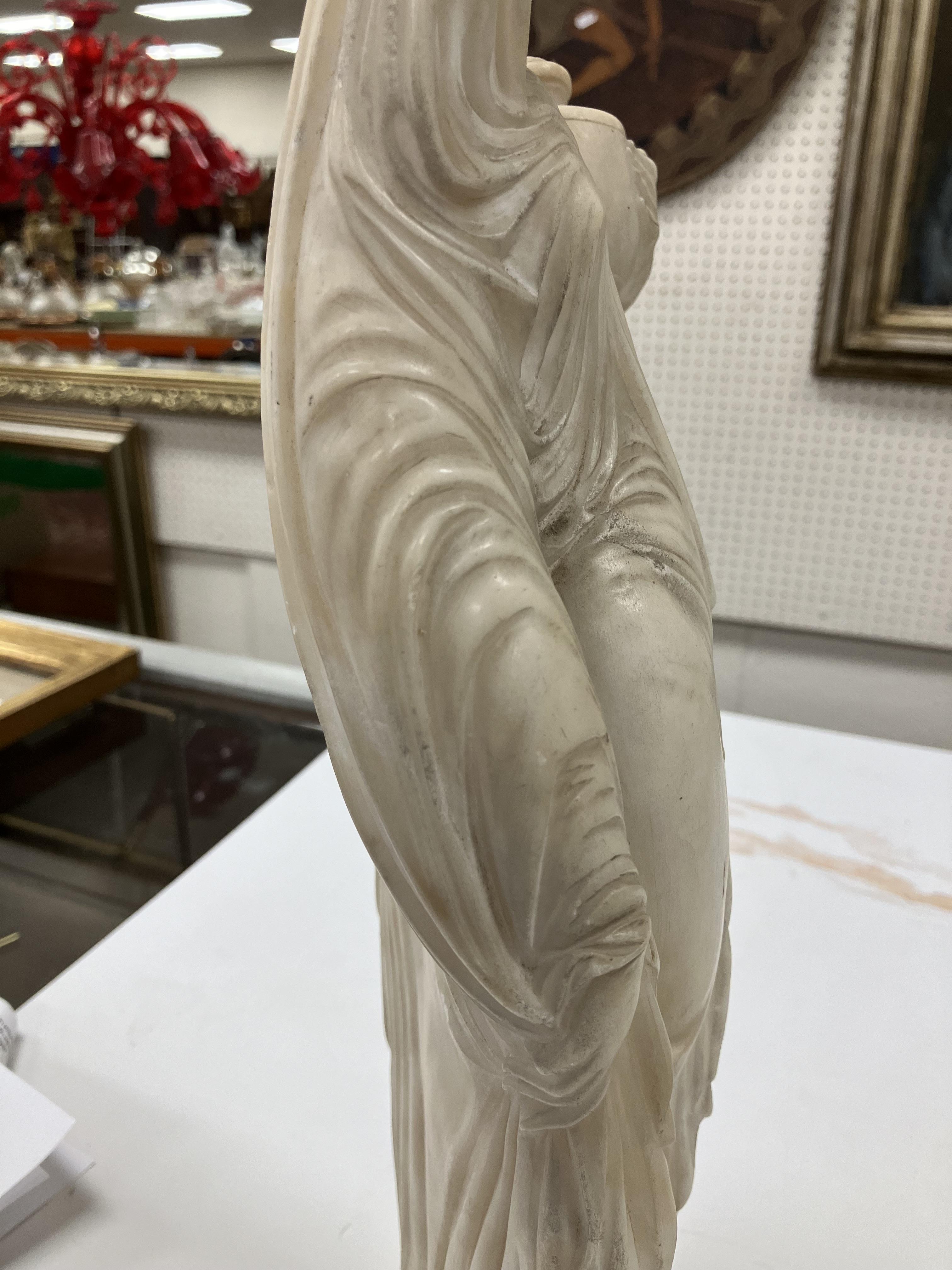 A carved white marble figure of "Phryne' - Image 13 of 42