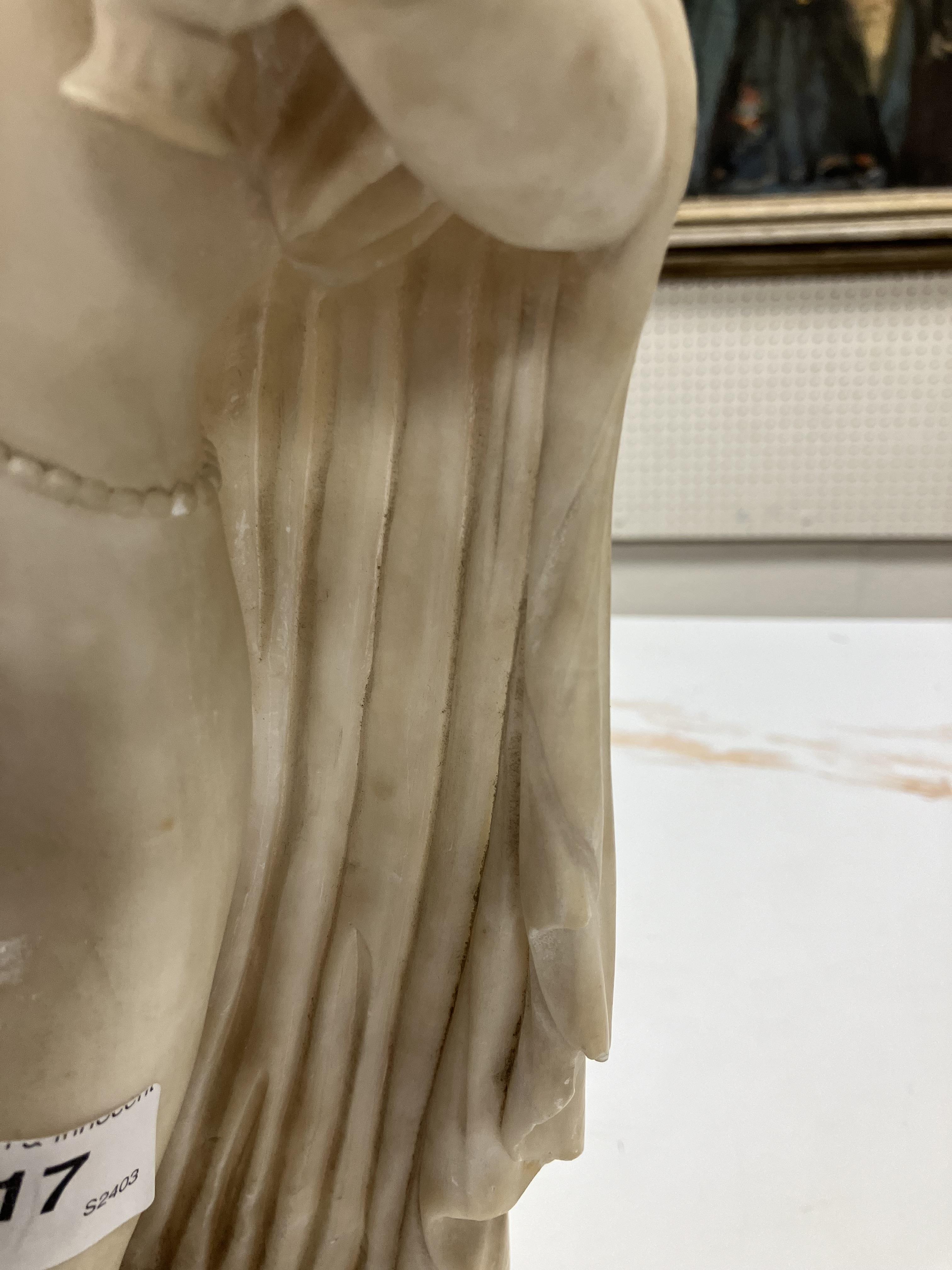 A carved white marble figure of "Phryne' - Image 34 of 42