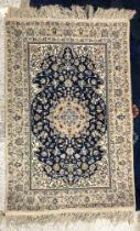A Nian rug, the central panel set with f