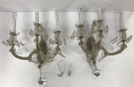 A pair of early 20th Century glass three
