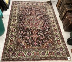 A fine Persian carpet, the central panel