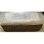 A Victorian upholstered box ottoman on i