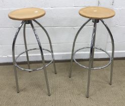 A pair of Merak plywood seated stools on