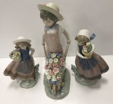 A collection of Lladro figures comprisin
