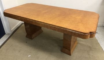 A 1930s Art Deco burr maple veneered dining table attributed to Harry and Lou Epstein,
