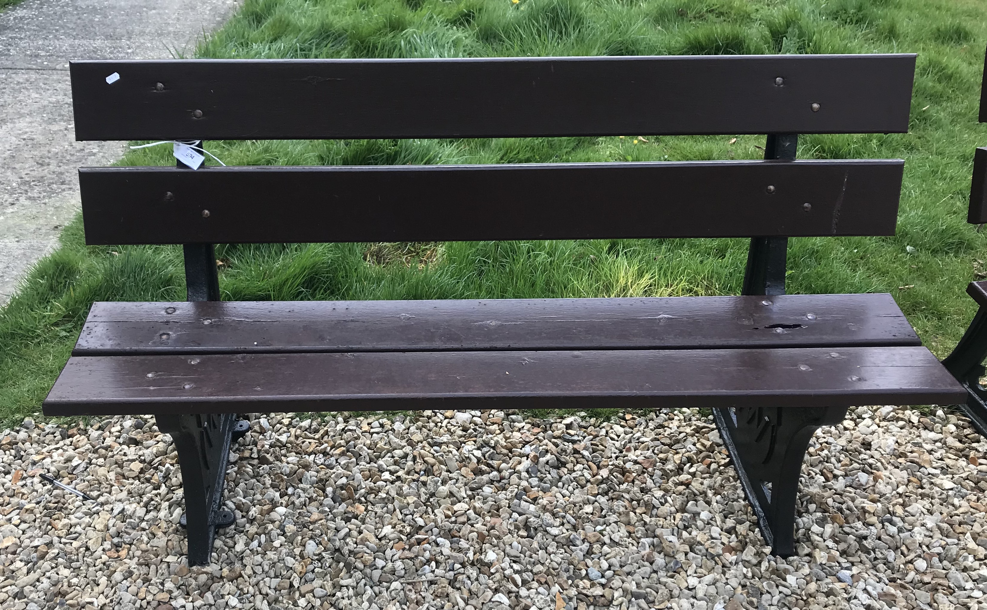 A Bristish Railways bench with wooden sl