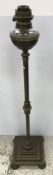 A late Victorian brass column oil standa