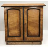 A Victorian satinwood slope front statio