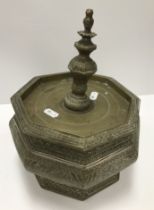 An Indonesian engraved brass betel jar a