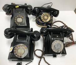 A collection of four vintage black telep