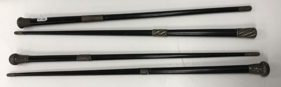 A Victorian ebonised and silver mounted conductor's baton, the ferrule inscribed 