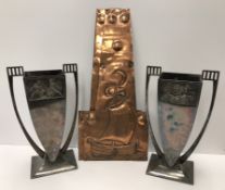 A pair of WMF Art Deco plated vases decorated with Classical style panels in impressed mark to base