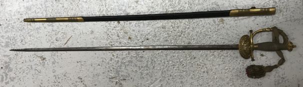 A Victorian officer's dress sword, the engraved blade with scrolling foliate decoration,