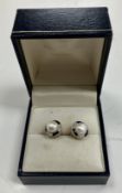 A pair of 18 carat gold mounted pearl, sapphire and diamond ear studs,