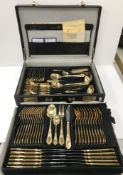 An SBS Solingen 23/24 CT gold plated canteen of cutlery, twelve place settings comprising, knives,