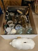 A box containing sundry items to include cast metal door porter depicting a cow,