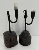 A late 18th/early 19th Century wrought iron rush light holder with candle holder and turned wooden