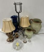 Two Denby pottery jugs with piped swirling decoration together with a Ewenny pottery vase in blue