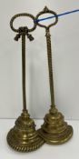 A 19th Century brass door porter in the manner of William Tonks & Sons Birmingham with tassel