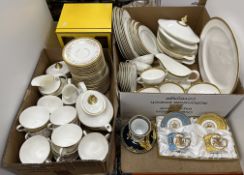 A quantity of Royal Doulton Royal Gold dinner wares comprising eight dinner plates,