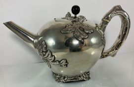 A George IV silver teapot in the Chinese