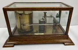 A Negretti & Zambra of London oak cased