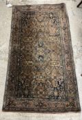 A wool Persian design rug, the central p