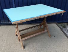 A vintage oak framed drawing board of ty