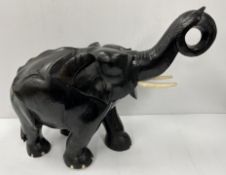 An early to mid 20th Century carved tree